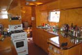 Spectacular Kitchen Stove and Stainless Countertop in 1948 Spartan Manor Trailer